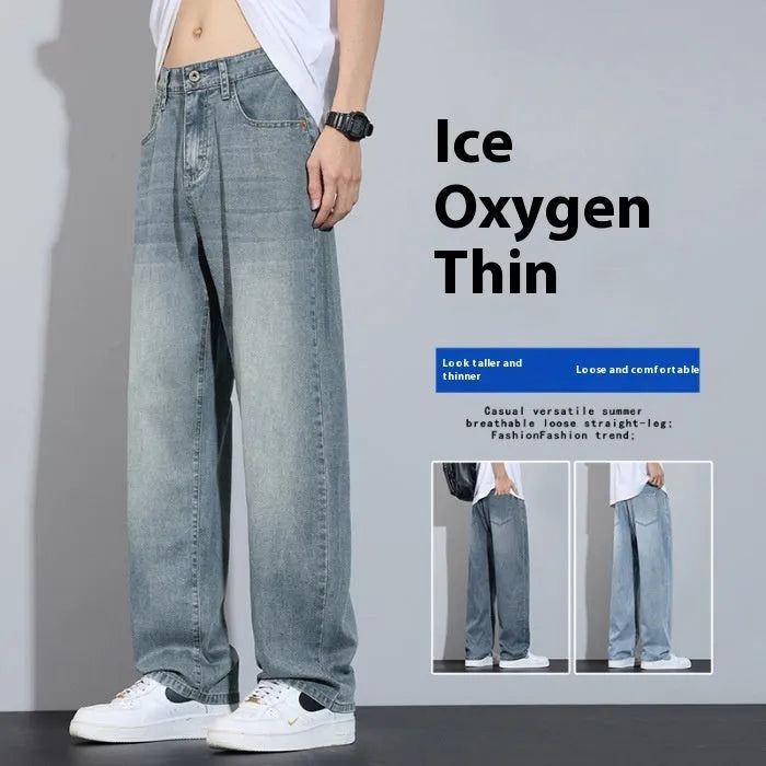 Straight leg denim trousers in a wide leg style on a hanger, showing the zip fly placket.