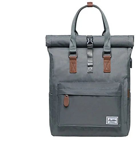 Casual polyester daypack in black showing cover opening and internal laptop pocket.