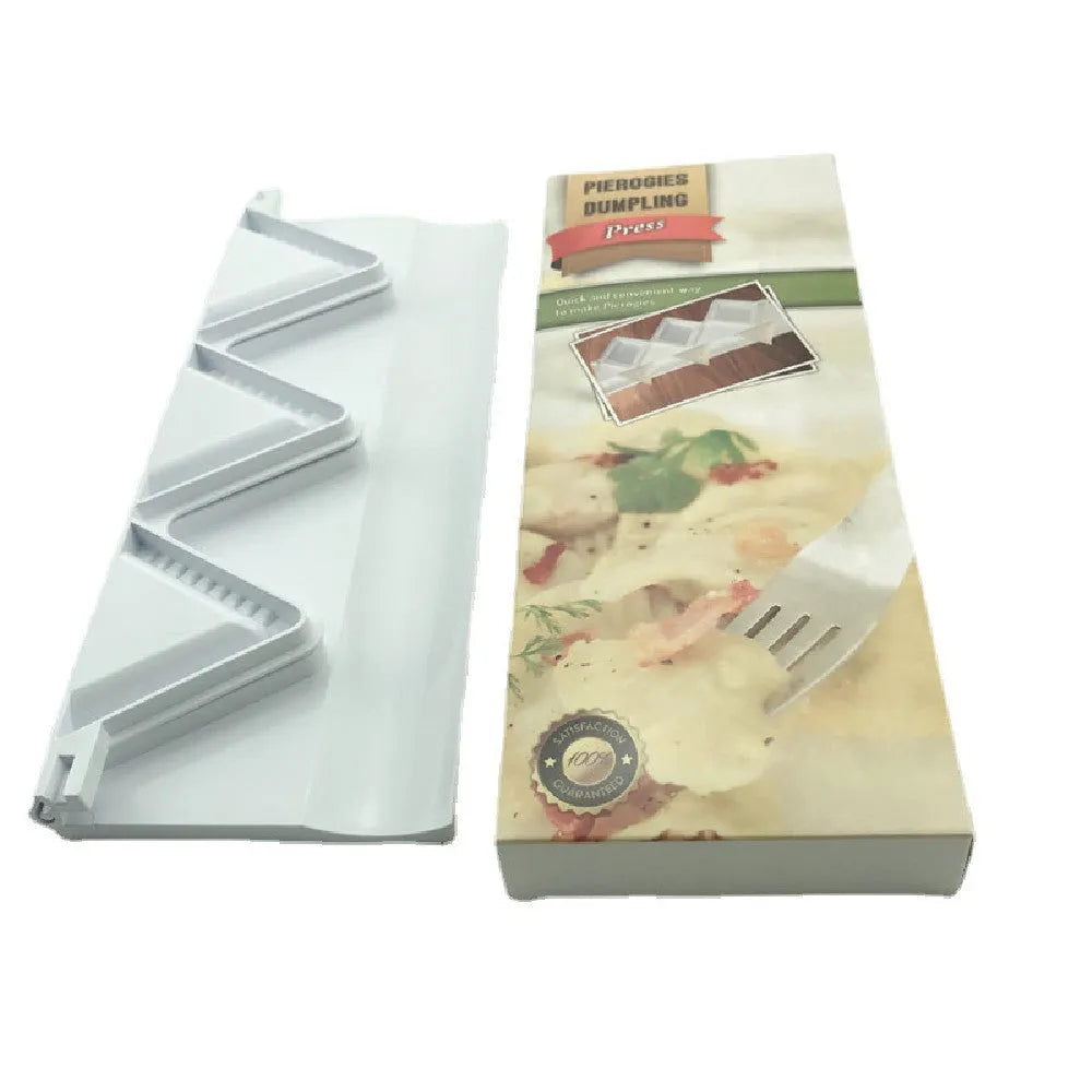 White plastic dumpling mold 28.5cm long on plain background