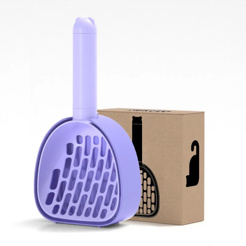 White ABS plastic cat litter scoop with a stand-up base and hidden bag storage compartment.