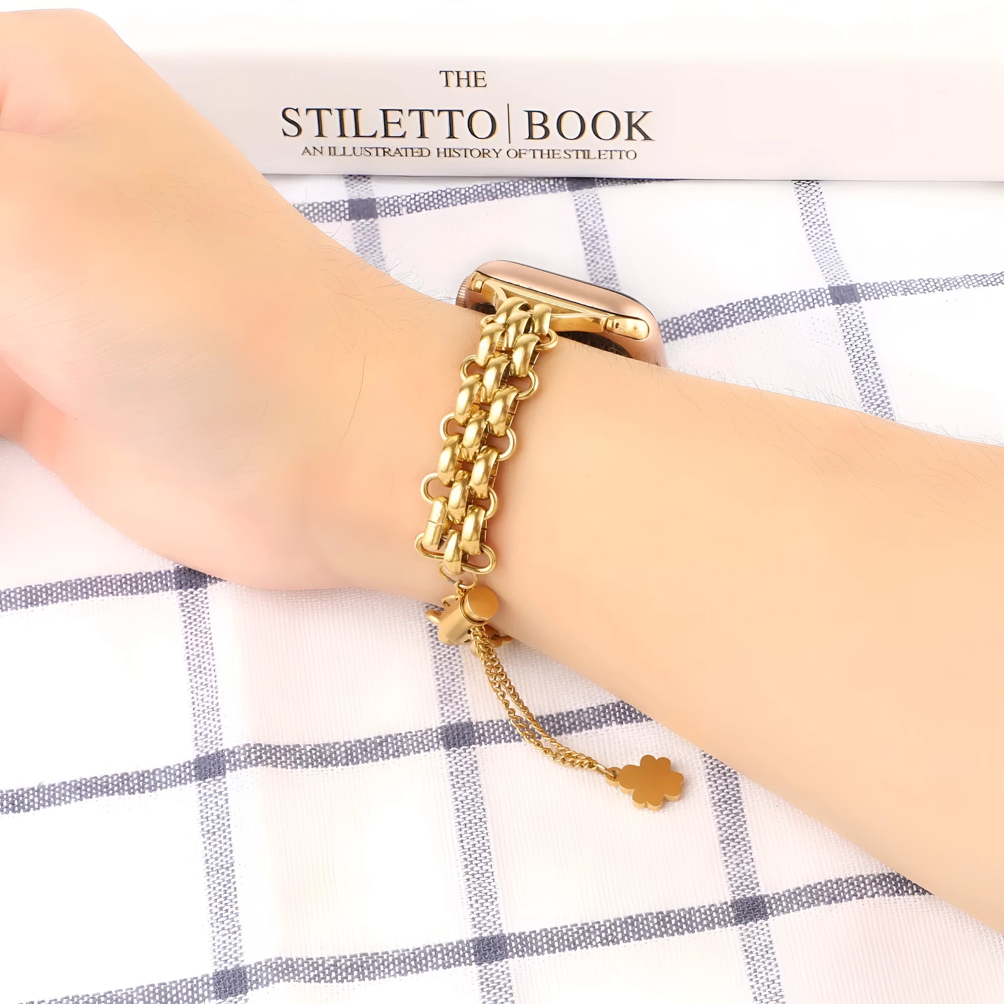 Stainless steel double row chain watch band for Apple Watch in silver on sport-style background