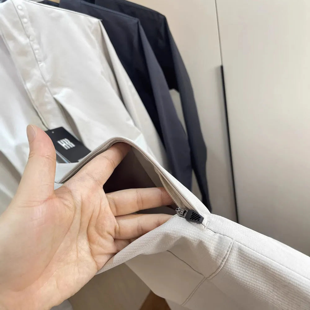 Men's stand collar casual jacket in polyester, shown in black, dark blue, or milky white.