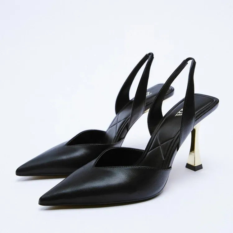 Apricot patent leather pointed high heels for women with a shallow mouth design on a white background.