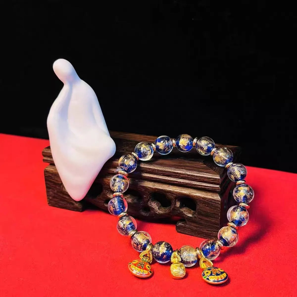 Ancient French Glaze Year glass bracelet with geometric shapes and auspicious court patterns in one of six colours.