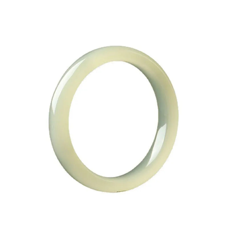 A polished natural jade round bar bracelet showing a winding silk texture on its surface.