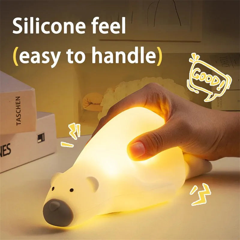 White bear silicone night light on bedside table with soft glow USB rechargeable children's lamp