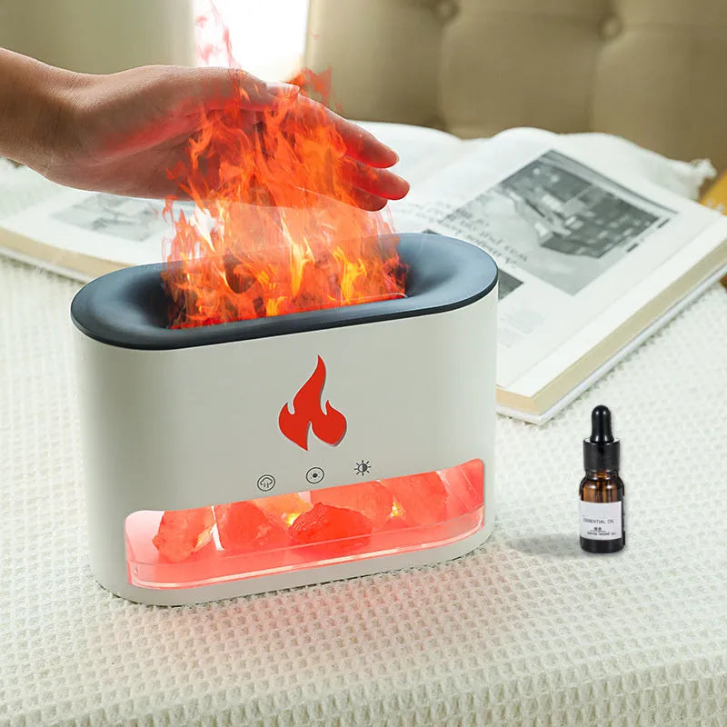 Square white flame humidifier aromatherapy machine with colourful 3D simulation flame on a desk.