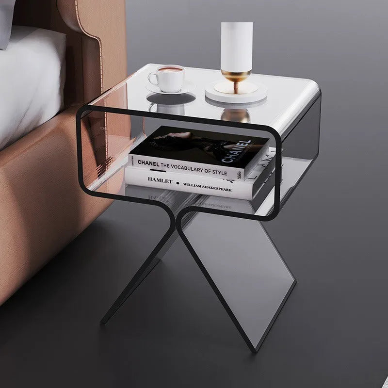 Transparent acrylic side table with bracket frame in living room setting