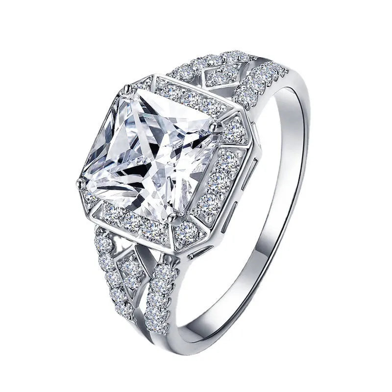 Geometric hollow zircon ring with quadrilateral design in platinum colour on copper