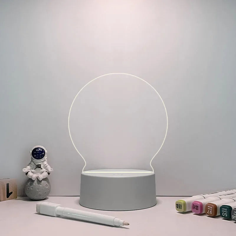 Acrylic message board night lamp with warm light showing round base and multiple picture shape options