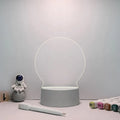 Acrylic message board night lamp with warm light showing round base and multiple picture shape options