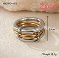 Stacked stainless steel rings with 18K gold plating in multiple colour options on a woman's hand.