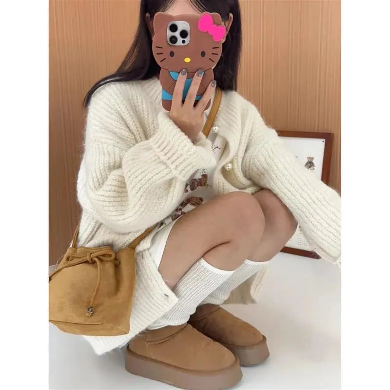 Brown suede crossbody shoulder bag with visible sewing line detail, retro style