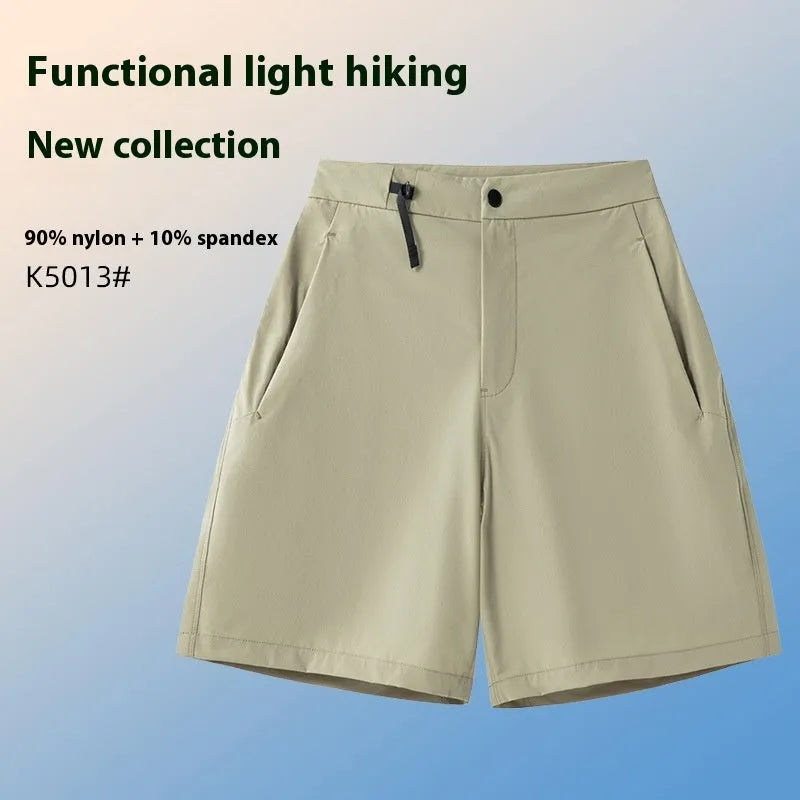 Man wearing khaki 3D cut quick-dry sports shorts with four-way stretch, suitable for running.