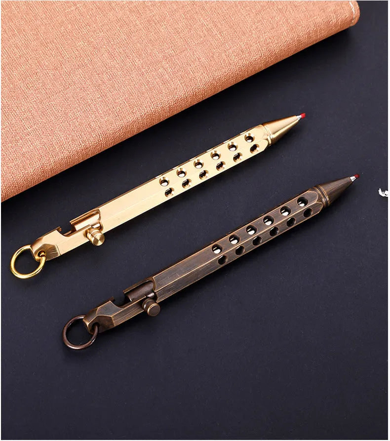 Brass hexagonal bolt-action pen showing six-angle design and bolt mechanism