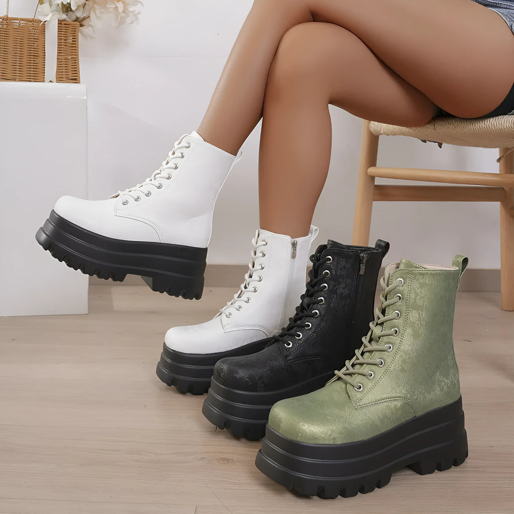 Women's black retro platform Martin boots with chunky heel and side zipper on a three-layer sole