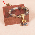 Men's gradient ceramic Yonghe blessing bracelet with coloured glaze beads on a wrist.