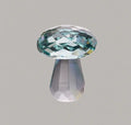 Modern geometric crystal mushroom decoration in transparent, green, red, or yellow, 40 by 53 millimetres.