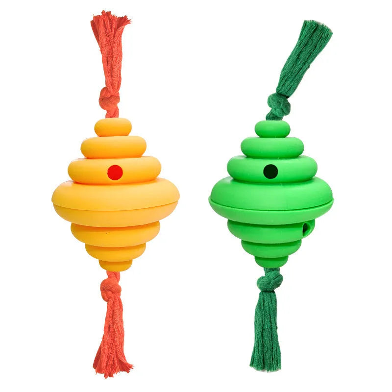 Green and yellow spiral dog ball with attached rope for tug-of-war and treat dispensing