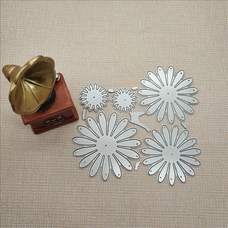 Silver high carbon steel flower cutting mould for baking decoration measuring 12.5 by 13 centimetres