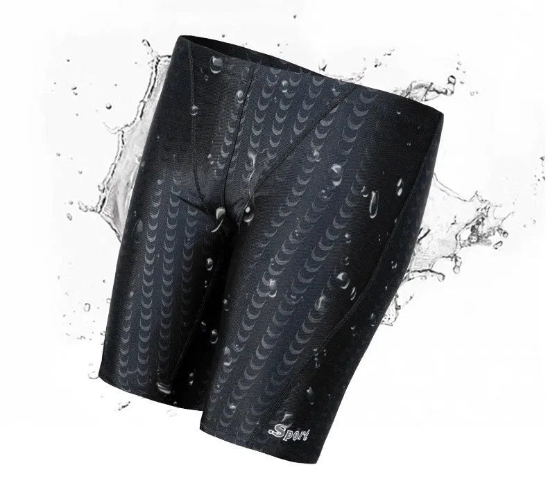 Men's solid colour swimming trunks in waterproof shark skin polyester fabric, shown in larger sizes.