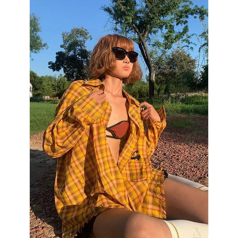 Dopamine Yellow and black plaid pattern on a loose-fitting unisex cardigan-style shirt.