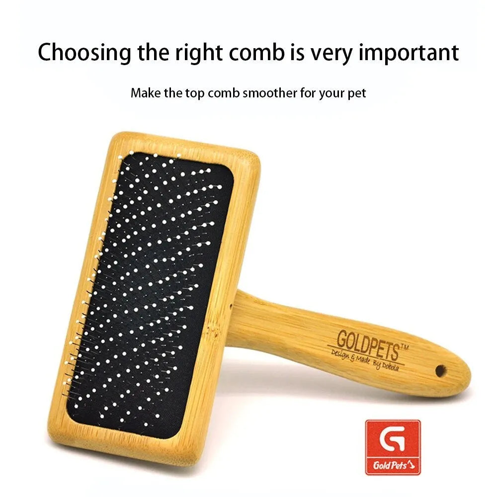 Goldpets bamboo and wood slicker brush for pets with stainless steel pins on a wooden handle.