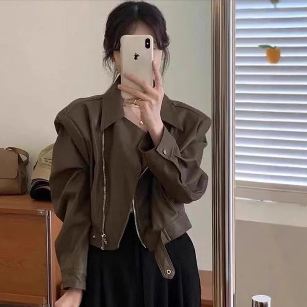 Women's brown retro leather coat jacket with slim fit, regular sleeves, and practical pockets