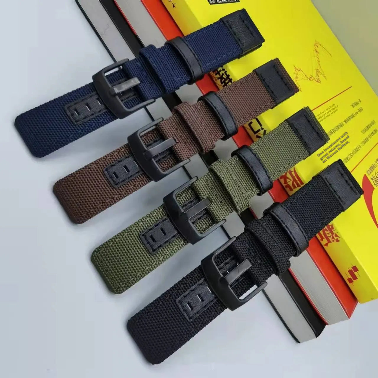 Oxford cloth canvas watch strap shown in Army Green colour, demonstrating its textured fabric and buckle.