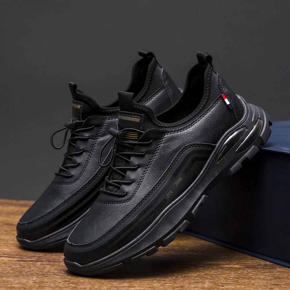 Men's black waterproof fleece-lined sneakers with low-top design and rubber sole