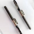 Pair of silver laptop screen hinge shafts for Apple MacBook Pro 15-inch A1286 model.