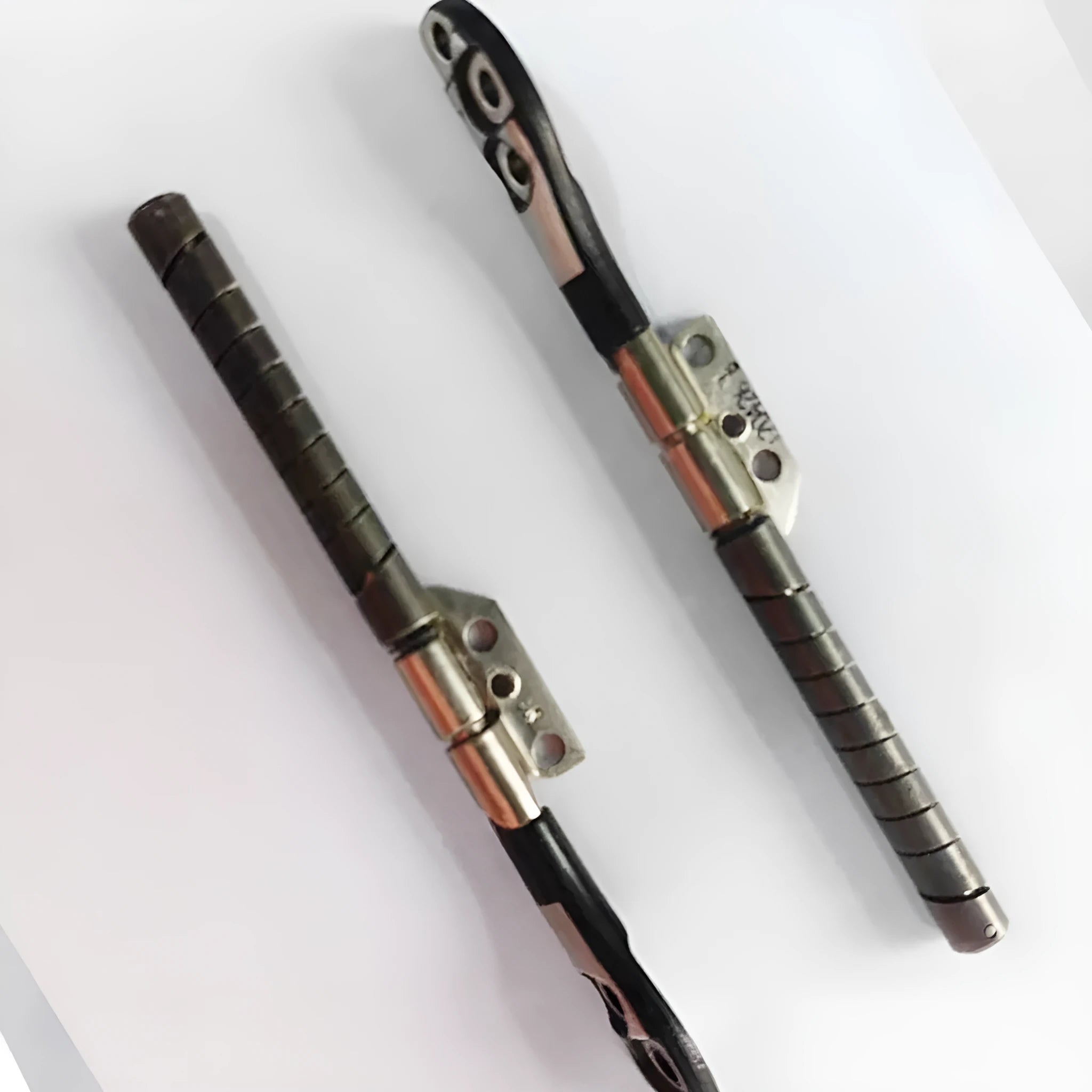 Pair of silver laptop screen hinge shafts for Apple MacBook Pro 15-inch A1286 model.