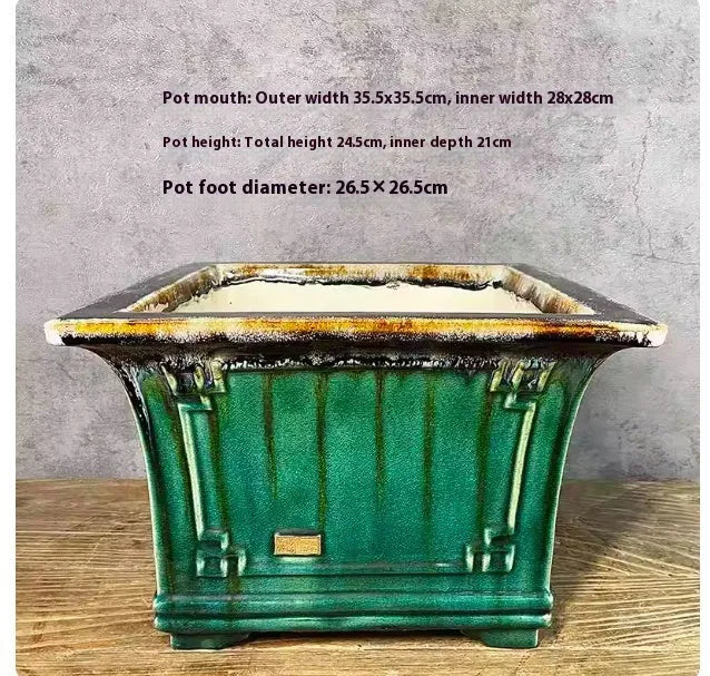 Ceramic square mouth flower pot with green crackle glaze finish, large size 36, on wooden surface