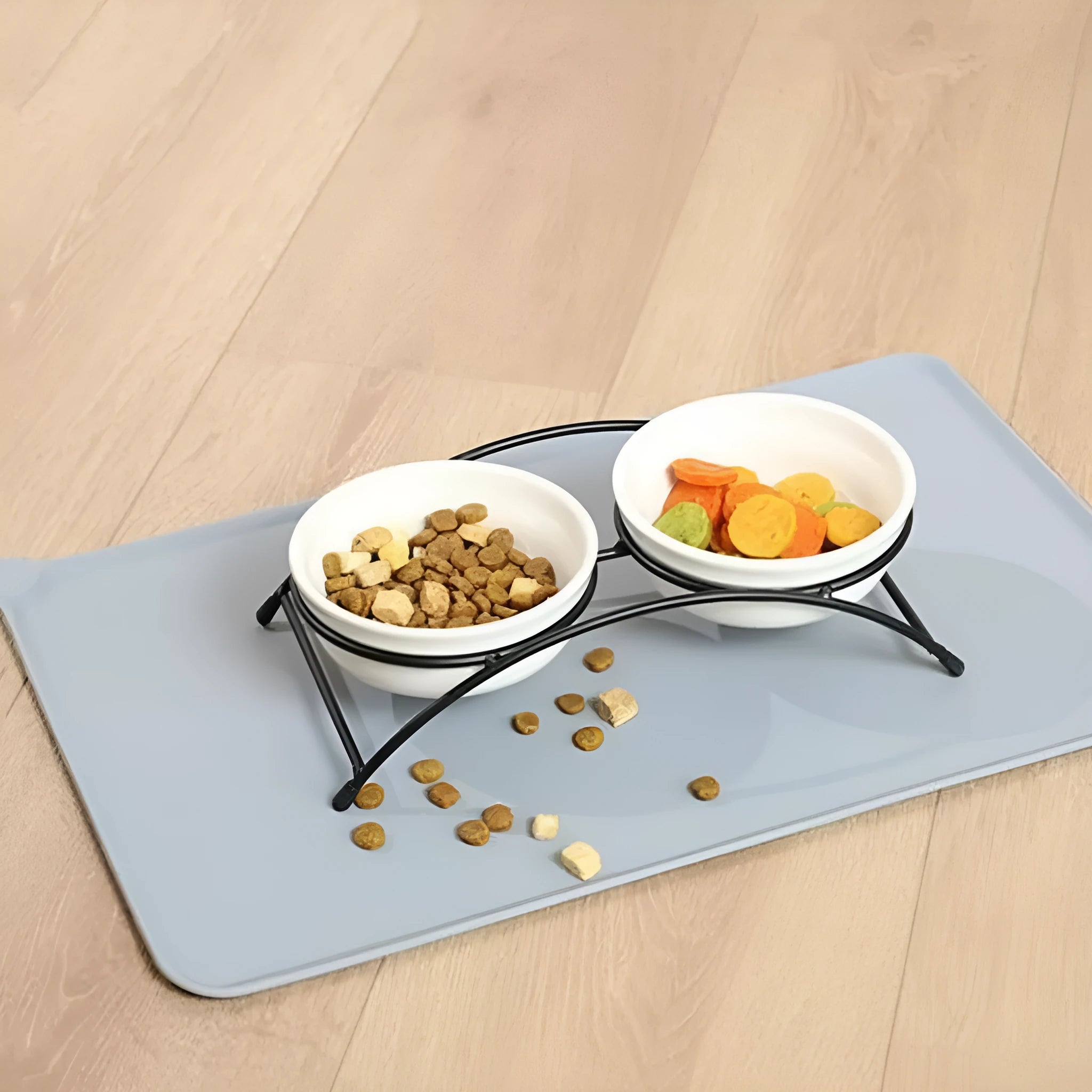 Silicone pet food placemat in blue colour with a raised lip, showing a dog bowl placed on it.