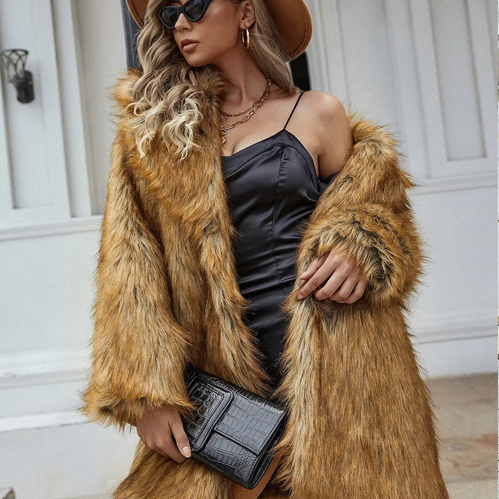 Yellow women's faux fur coat with a loose fit and mid-length silhouette.
