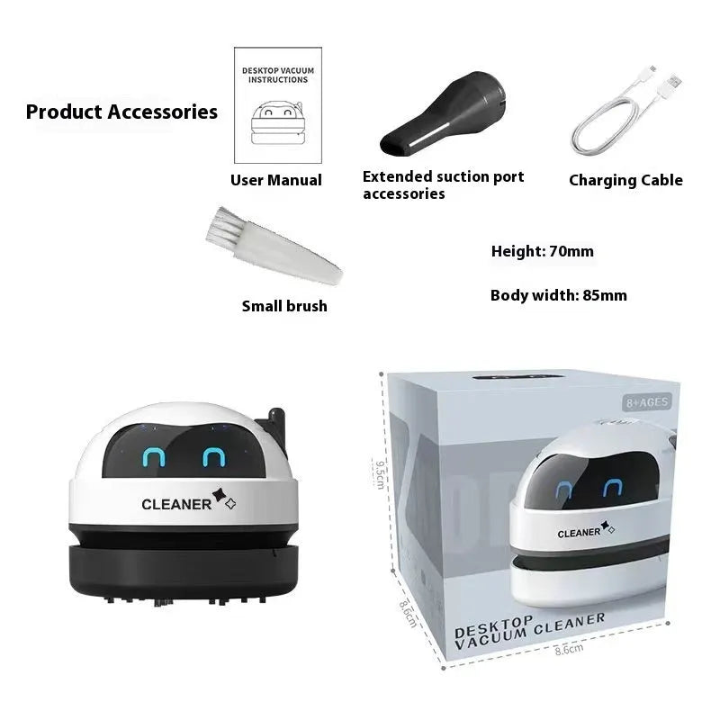Blue rocket-shaped USB rechargeable handheld desktop vacuum cleaner on a wooden desk next to a keyboard