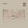 A mulberry silk sleep mask in champagne gold colour, shown lying flat.