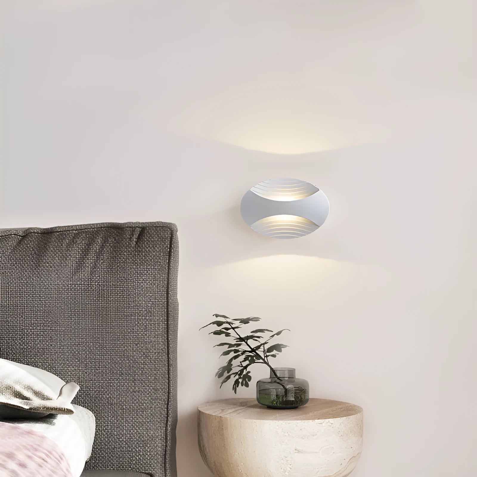 Modern aluminium wall lamp in metallic finish with wall-mounted design for bedroom bedside lighting