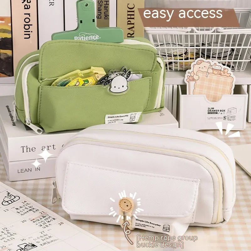 Green canvas pencil case with button closure, large capacity for pens.