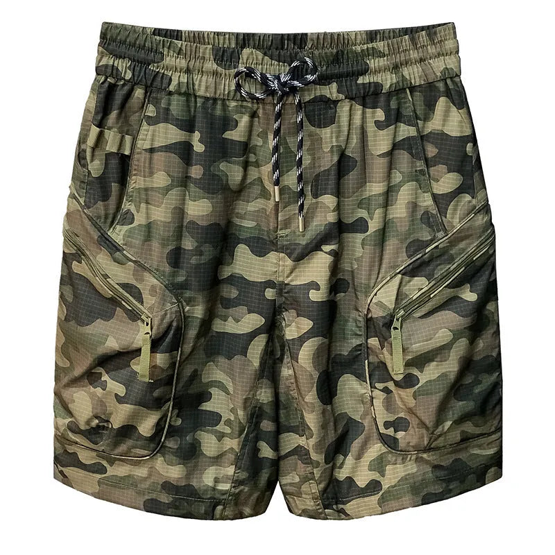 Men's camouflage cargo shorts in a loose fit with cargo pockets, shown in khaki colour.