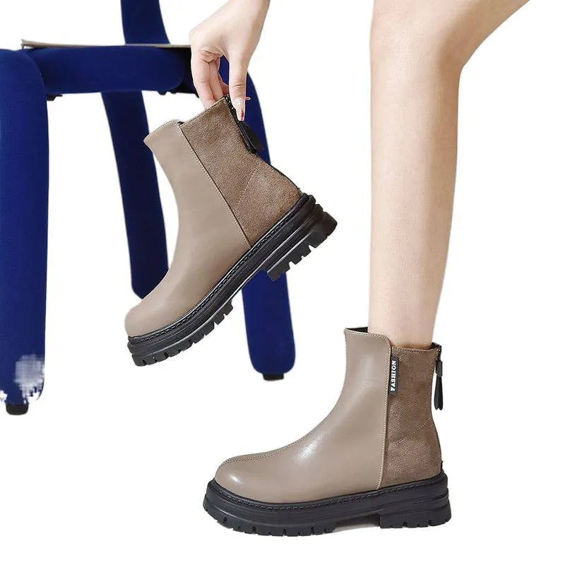 Large size women's platform Martin boots in solid black with rubber sole, low tube design