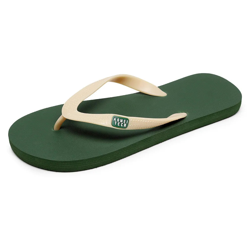 Men's black rubber sole flip-flops with an EVA foam upper on a wooden deck