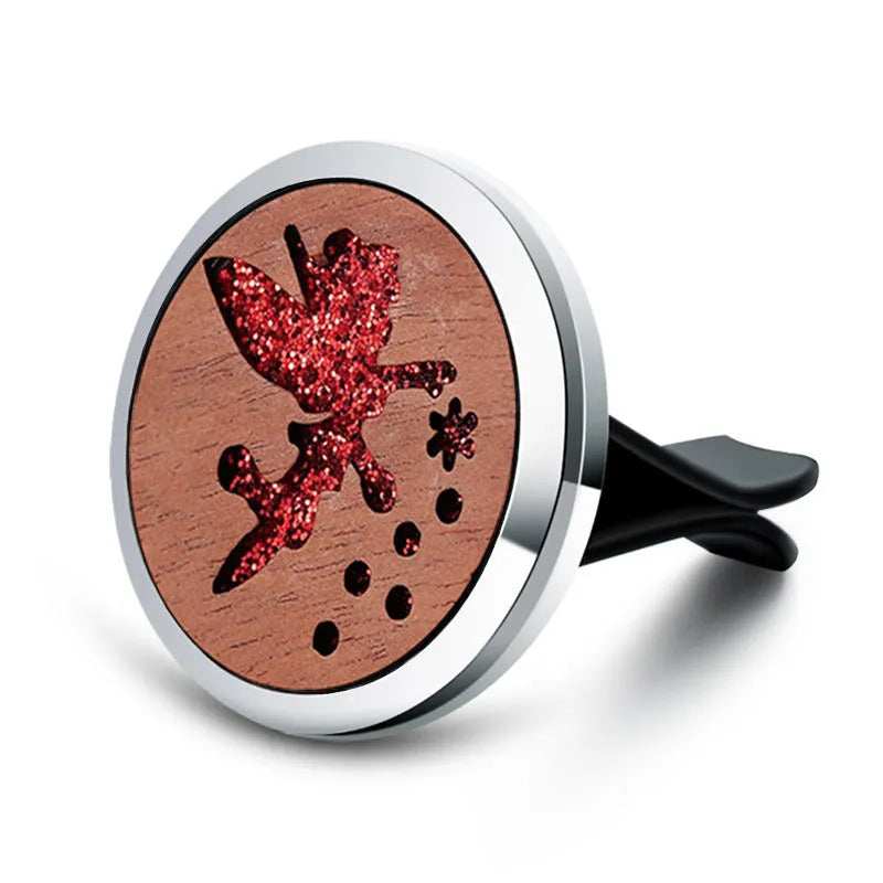 Round car vent aromatherapy clip in alloy wood construction showing hollow centre for incense