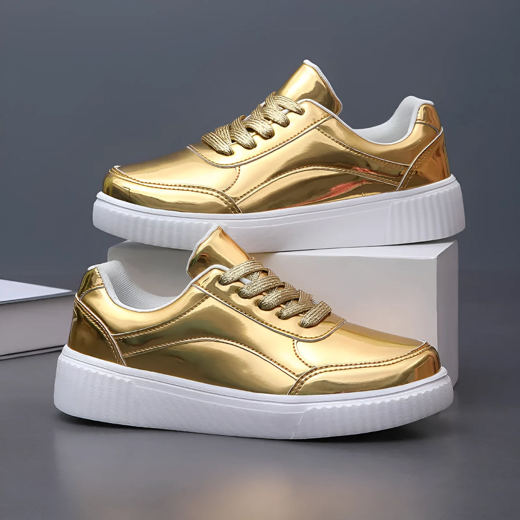 Gold sequin platform sneakers with a round toe and 3-5cm mid heel on a white background