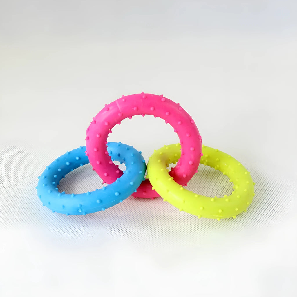 TPR plastic three-chain dog molar chew toy with raised cleaning nubs, shown in a random colour.
