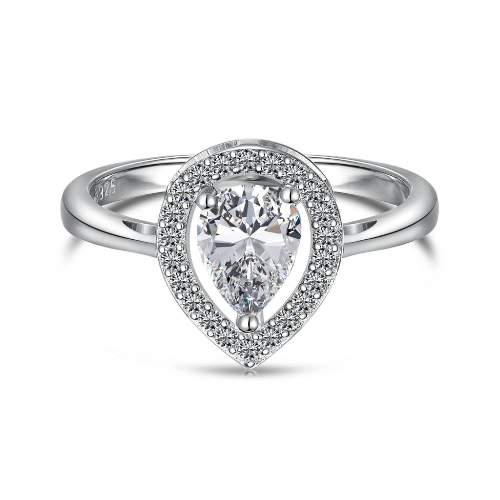 S925 sterling silver ring with drop-shaped diamond zircon stone in light luxury style on a plain background