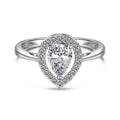 S925 sterling silver ring with drop-shaped diamond zircon stone in light luxury style on a plain background