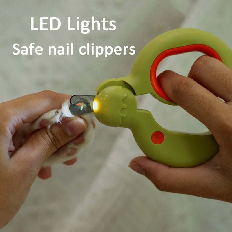 Blue pet nail clippers with LED light on, showing non-slip handles and stainless steel blade.