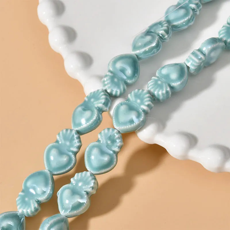 Ceramic love heart small torch beads in multiple colours for jewellery making with straight holes