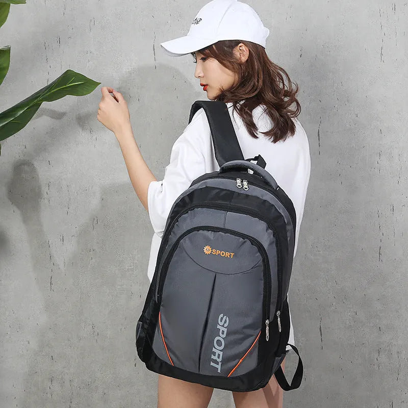 Large capacity nylon backpack for men in black colour with curved shoulder straps and letter patterning